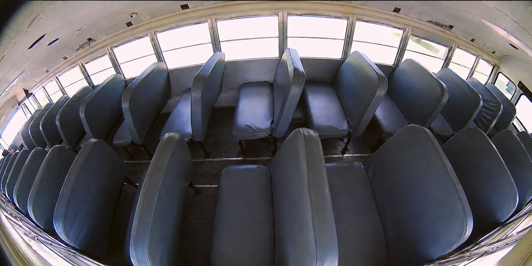 Example wide-angle HD1700V view across school bus passenger seats.