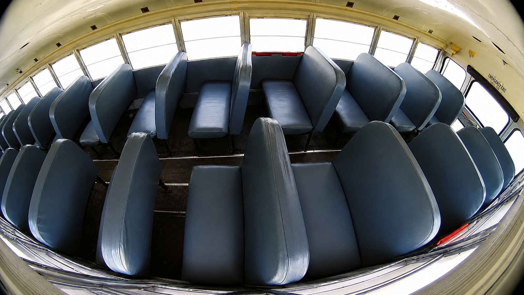 Example wide-angle HD1700V view across school bus passenger seats from camera C3.