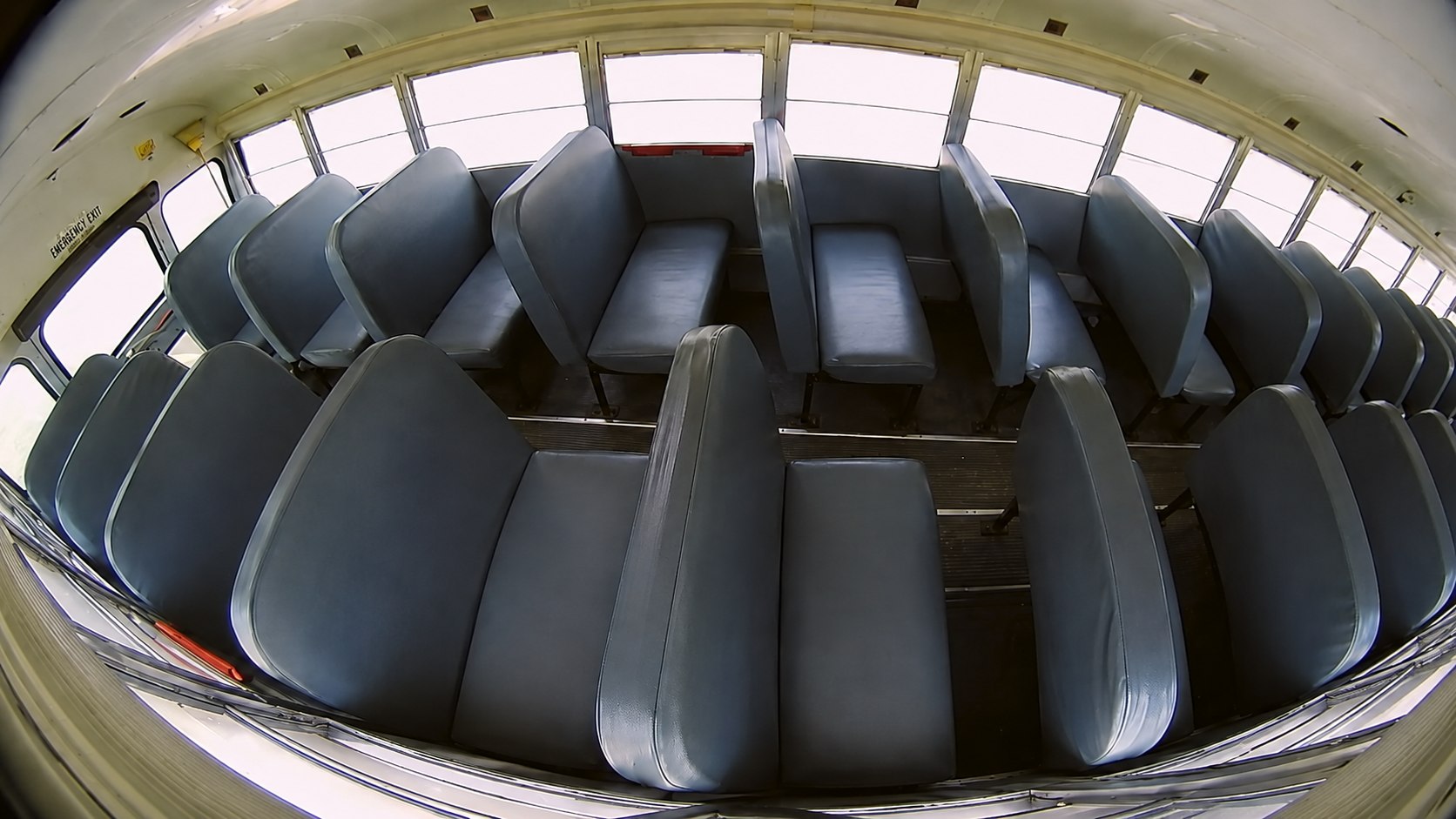 Example wide-angle HD1700V view across school bus passenger seats from camera C5.