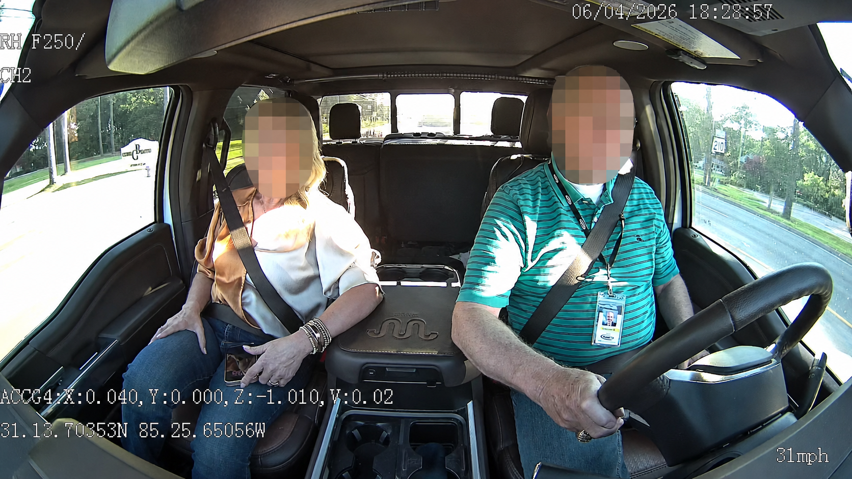 Interior cab-facing VX4AI camera view with both occupants anonymized for privacy.